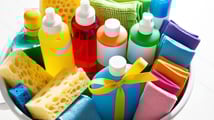 a basket of cleaning supplies